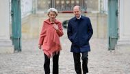 German Chancellor Olaf Scholz (right) and European Commission President Ursula von der Leyen make their way to a news conference at the federal cabinet retreat at Schloss Meseberg palace in Meseberg near Gransee, northeastern Germany on March 5, 2023. (Photo by Tobias SCHWARZ / AFP)