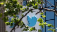 In this file photo taken on April 26, 2022 the Twitter logo is seen at their headquarters in downtown San Francisco, California.  (Photo by Amy Osborne / AFP)