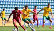 Action during the match between Qatar and Australia at AFC U20 Asian Cup yesterday. 
