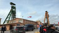 A fire helicopter flies over the potassium mine where three people were trapped after a collapse, in Suria, 75 km from Barcelona, on March 9, 2023.  (Photo by LLUIS GENE / AFP)