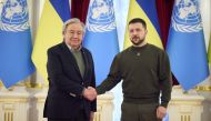 This handout picture taken and released by the Ukrainian Presidential press service on March 8, 2023, shows Ukrainian President Volodymyr Zelensky (right) welcoming Secretary-General of the United Nations Antonio Guterres prior to their meeting in Kyiv. (Photo by Ukrainian Presidential Press Service / AFP) 