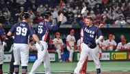 Czech Republic's Martin Muzik (R) celebrates as he crosses home plate after hitting a three-run homer during the World Baseball Classic (WBC) Pool B round game between the Czech Republic and China at the Tokyo Dome in Tokyo on March 10, 2023. (Photo by Kazuhiro NOGI / AFP)