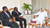 Minister of Trade and Industry of the Republic of Malawi H E Simplex Chithyola in the presence of QC board member Mohamed bin Ahmed Al Obaidli.
