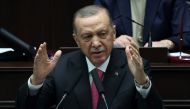 Turkish President and leader of the Justice and Development Party (AKP), Recep Tayyip Erdogan delivers a speech during the party's group meeting at the Turkish Grand National Assembly in Ankara on March 15, 2023. (Photo by Adem Altan / AFP)