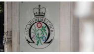 The logo for the Supreme court at the entrance to the court in central London on the third and final day of the hearing into the decision by the government to prorogue parliament on September 19, 2019. File photo / AFP

