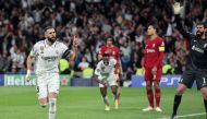 Real Madrid’s French forward Karim Benzema (left) celebrates after scoring a goal against Liverpool, yesterday. AFP