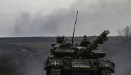 A Ukrainian T64 tank moves outside the area of Bachmut, in the region of Donbas, on March 15, 2023. (Photo by Aris Messinis / AFP)