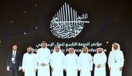 Minister of Commerce and Industry H E Sheikh Mohammed bin Hamad bin Qassim Al Abdullah Al Thani (third left) with other officials at the conference. 