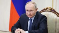 Russian President Vladimir Putin chairs a meeting on the social and economic development of Crimea and Sevastopol via a video link at the Kremlin in Moscow on March 17, 2023. (Photo by Mikhail METZEL / SPUTNIK / AFP)