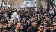 Protesters march during a demonstration of students and pupils in central Athens on March 3, 2023, following a deadly train accident near the city of Larissa. (Photo by Louisa Gouliamaki / AFP)


