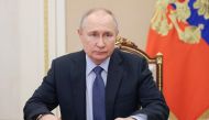 Russian President Vladimir Putin chairs a Security Council meeting via a video link at the Kremlin in Moscow on March 17, 2023. (Photo by Mikhail METZEL / SPUTNIK / AFP)