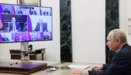 Russian President Vladimir Putin chairs a Security Council meeting via a video link at the Kremlin in Moscow on March 17, 2023. (Photo by Sergei ILYIN / SPUTNIK / AFP)