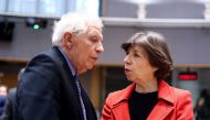 European Commission vice-president in charge for High-Representative of the Union for Foreign Policy and Security Policy Josep Borrell speaks with France's Minister for Europe and Foreign Affairs Catherine Colonna (R) ahead of the Foreign Affairs Council (FAC) at the EU headquarters in Brussels on March 20, 2023. (Photo by Kenzo Tribouillard / AFP)
 