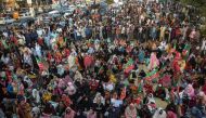 Supporters of Pakistan's former prime minister Imran Khan, gather during a protest in Karachi on March 19, 2023, demanding release of arrested party workers in recent police clashes. (Photo by Rizwan Tabassum / AFP)