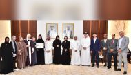 Minister of Education and Higher Education H E Buthaina bint Ali Al Jabr Al Nuaimi (7th right); QU President Dr. Hassan Rashid Al Derham (6th right); and other officials at the honouring ceremony.   