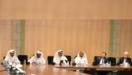 QU President Dr. Hassan Al Derham (third right) addresses the attendees, which included Vice Presidents, Deans, and senior officials at the QU and members of the press.