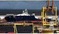The Petrel tipped over in at dry dock in Edinburgh Wednesday during high winds. Andy Buchanan / AFP
