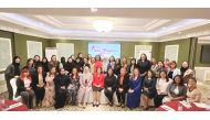 Philippine Ambassador in Qatar, H E Lillibeth V Pono (seventh left) with other Filipina professionals during the launch of IAM Filipina.