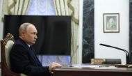 Russian President Vladimir Putin attends a meeting with Transport Minister at the Kremlin in Moscow on March 25, 2023. (Photo by Gavriil GRIGOROV / SPUTNIK / AFP)