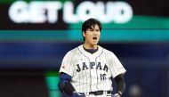 Shohei Ohtani #16 of Team Japan celebrates at second base after hitting a double in the ninth inning against Team Mexico during the World Baseball Classic Semifinals at loanDepot park on March 20, 2023 in Miami, Florida. Eric Espada/Getty Images/AFP