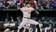 Grayson Rodriguez #30 of the Baltimore Orioles throws a pitch during the first inning of his Major League debut against the Texas Rangers at Globe Life Field on April 05, 2023 in Arlington, Texas. (Photo by Sam Hodde / GETTY IMAGES NORTH AMERICA / Getty Images via AFP)