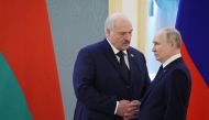 Russian President Vladimir Putin and Belarus's President Alexander Lukashenko are seen prior to talks on union between the two countries at the Kremlin in Moscow on April 6, 2023. (Photo by Mikhail Klimentyev / SPUTNIK / AFP)