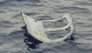 This handout photo taken on April 6, 2023 and received on April 7, 2023 by the 11th Regional Coast Guard Headquarters of the Japan Coast Guard shows flotsam floating on the surface in the search area after a Japan Ground Self-Defense Force (GSDF) military helicopter with 10 people on board disappeared from radar the day before near an island in the southern region of Okinawa. Photo by Handout / Japan Coast Guard / AFP