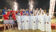 Winners of the Katara Ramadan Beach Volleyball Championship along with Katara officials.