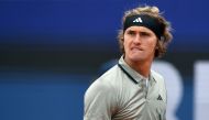Germany's Alexander Zverev reacts as he plays against Australia's Christopher O'Connell during the second round match at the ATP Tennis Open in Munich, southern Germany, on April 20, 2023. Photo by Christof STACHE / AFP