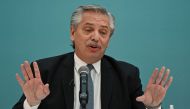 In this file photo taken on July 22, 2022, Argentine President Alberto Fernandez speaks during a government act at the Bicentennial Museum in Buenos Aires. (Photo by Luis Robayo / AFP)
