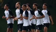Al Sadd players attend a training session ahead of Al Rayyan game.