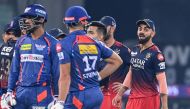 Royal Challengers Bangalore's Virat Kohli (R) gestures during the Indian Premier League (IPL) Twenty20 cricket match between Lucknow Super Giants and Royal Challengers Bangalore on May 1, 2023. (Photo by Sajjad Hussain / AFP)