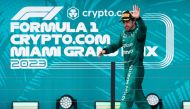 MAY 07: Third placed Fernando Alonso of Spain and Aston Martin F1 Team celebrates on the podium during the F1 Grand Prix of Miami at Miami International Autodrome on May 07, 2023 in Miami, Florida. Photo by Rudy Carezzevoli / GETTY IMAGES NORTH AMERICA / Getty Images via AFP