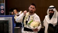 In this file photo taken on January 19, 2023, Paris Saint-Germain's Argentinian forward Lionel Messi arrives at an airport in Riyadh, ahead of a friendly football match against a select side made up of players from Cristiano Ronaldo's new club Al Nassr and their Saudi rivals Al Hilal. (Photo by Fayez Nureldine / AFP)
