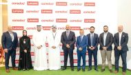 Ooredoo and Lenovo officials pose for a photograph after signing the MoU. 