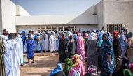 Voters wait to vote at a polling station in Nouakchott on May 13, 2023. Photo by MED LEMINE RAJEL / AFP
