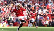 Manchester United's Argentinian midfielder Alejandro Garnacho scores his team's second goal during the English Premier League football match between Manchester United and Wolverhampton Wanderers at Old Trafford in Manchester, north west England, on May 13, 2023. (Photo by DARREN STAPLES / AFP)
