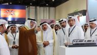 Minister of Transport H E Jassim Saif Ahmed Al Sulaiti (centre right) during his participation in the Middle East Rail event at the Abu Dhabi National Exhibition Centre in the UAE.