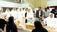 Undersecretary of the Ministry of Education and Higher Education Dr. Ibrahim bin Saleh Al Nuaimi interacting with exhibitors at the exhibition, yesterday.