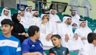 QOC President H E Sheikh Joaan bin Hamad Al Thani, Minister of Education and Higher Education 
 H E Buthaina bint Ali Al Jabr Al Nuaimi and QOC Secretary General Jassim Rashid Al Buenain along with other officials attending Schools Olympic Program competitions at Aspire Dome yesterday. 