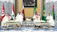 Amir H H Sheikh Tamim bin Hamad Al Thani (second left) after being welcomed upon arrival at King Abdulaziz International Airport in Jeddah, Saudi Arabia by Deputy Governor of Makkah Al Mukarramah region HRH Prince Badr bin Sultan bin Abdulaziz Al Saud and other officials. 
