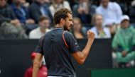 Russia's Daniil Medvedev reacts after winning a point against Denmark's Holger Rune during the final of the Men's ATP Rome Open tennis tournament on the central court of Foro Italico in Rome on May 21, 2023. (Photo by Tiziana FABI / AFP)