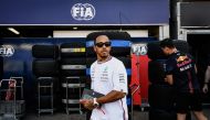 TOPSHOT - Mercedes' British driver Lewis Hamilton walks in the pit lane ahead of the Monaco Formula One Grand Prix at the Monaco street circuit in Monaco on May 25, 2023. (Photo by JEFF PACHOUD / AFP)