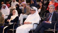 Minister of State and President of QNL H E Dr. Hamad bin Abdulaziz Al Kawari (centre) and other officials and experts at the session. 