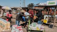 Roadside vendors sell goods at Mbare Musika in Harare on May 25, 2023. Photo by Jekesai NJIKIZANA / AFP