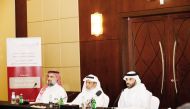 Minister of Awqaf and Islamic Affairs H E Ghanem bin Shaheen Al Ghanem (centre) and Director of Ibn Khaldon Centre for Humanities and Social Sciences Dr. Nayef Nahar Al Shammari (right) during the workshop in Doha, yesterday. 