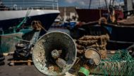 This picture shows marine litter that divers and fishermen collected, at Keratsini's sea food market, in Keratsini, on May 26, 2023. (Photo by Angelos Tzortzinis / AFP)