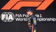 First placed Red Bull's Dutch driver Max Verstappen walks to podium at the end of the qualifying session for the Spanish Formula One Grand Prix at the Circuit de Catalunya on June 3, 2023 in Montmelo, on the outskirts of Barcelona. (Photo by Josep LAGO / AFP)