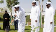 Officials during the tree-planting event.