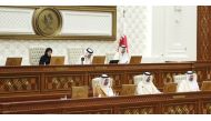 Shura Council Speaker H E  Hassan bin Abdullah Al Ghanim (top centre); Deputy Speaker H E Dr. Hamda bint Hassan Al Sulaiti (left) and Minister of Environment and Climate Change H E Sheikh Dr. Faleh bin Nasser bin Ahmed bin Ali Al Thani during the meeting of the Council, yesterday.
